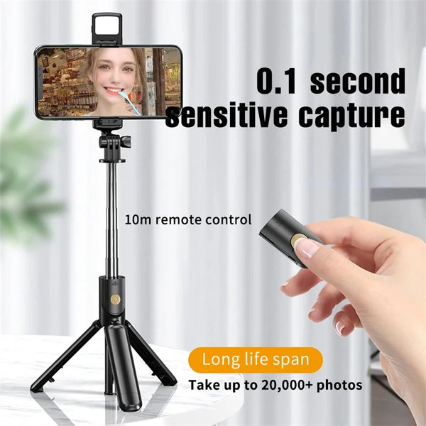 A black selfie stick tripod with a smartphone mounted, featuring a 10m remote control and LED fill light.