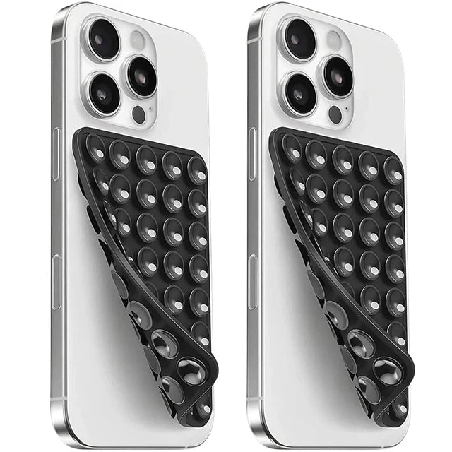 A white silicone suction cup phone mount with a double-sided grip shown in a diagonal angle.