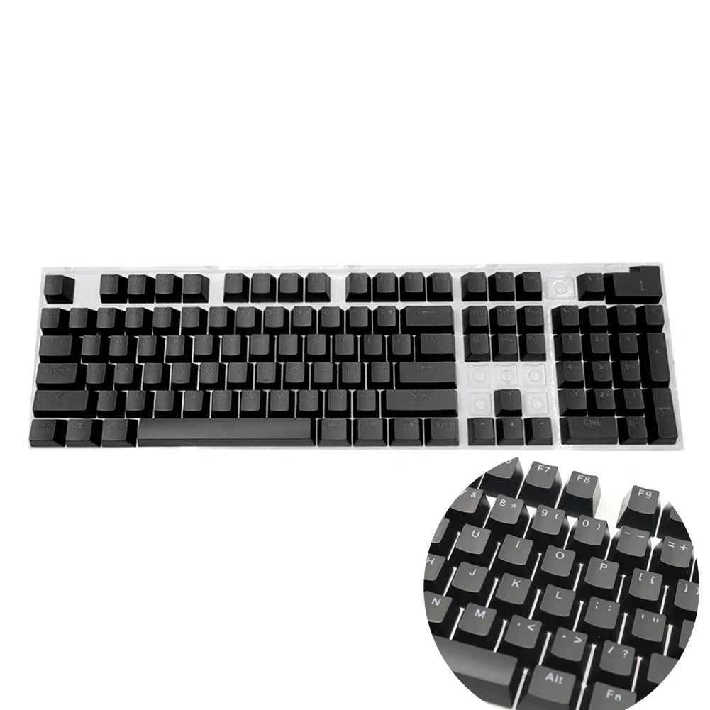 A set of 104-key backlit ABS mechanical keyboard keycaps shown in a row.