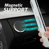 A hand holds a white smartphone attached to a magnetic mount, demonstrating a mini car mount holder for dashboard use.