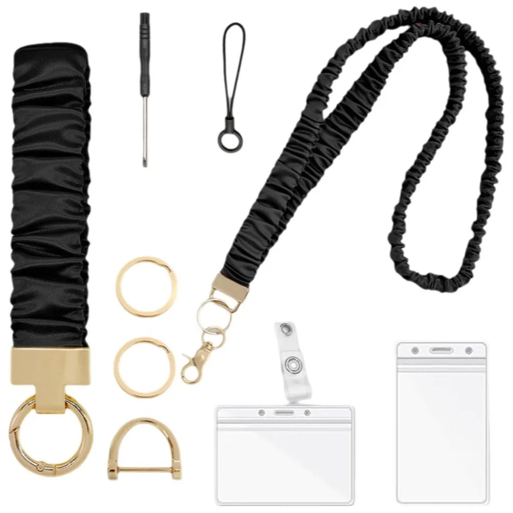 Black stretchy breakaway lanyard with a retractable reel and gold-toned ID badge holder.