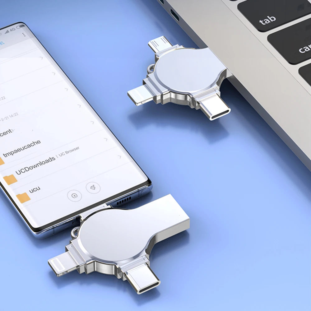 A silver USB flash drive is shown next to a tablet displaying a file management interface.