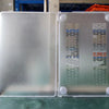 A clear, silver-colored hard shell laptop case for a MacBook Neo 13 is shown, displaying various ventilation patterns.