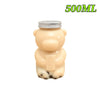 A light beige bear-shaped reusable water bottle with a silver lid.