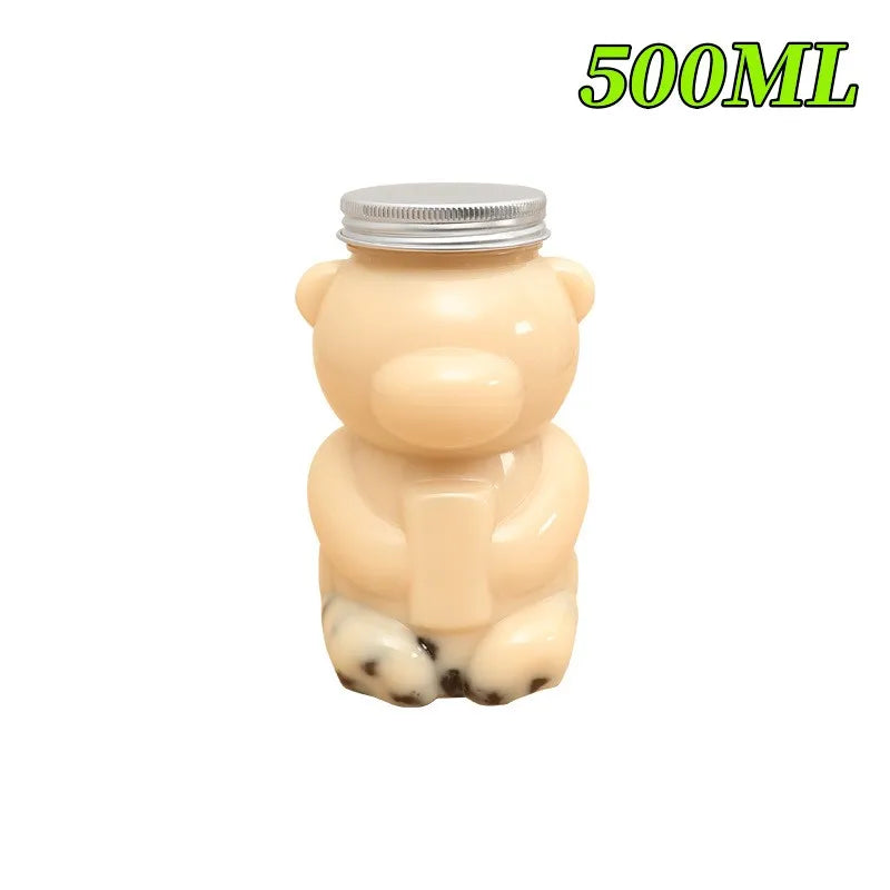 A light beige bear-shaped reusable water bottle with a silver lid.