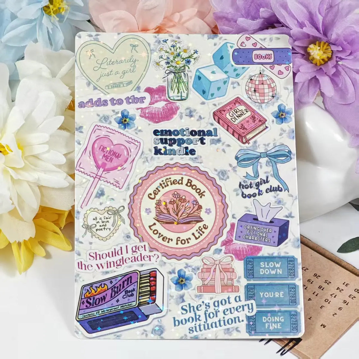 Buntes Insertkärtchen mit Herzdesign, Buchillustrationen und Text über emotionale Unterstützung.