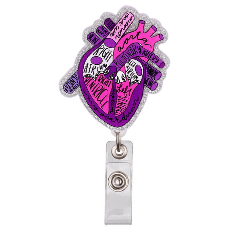 A silver badge reel featuring a detailed anatomical diagram of the heart.