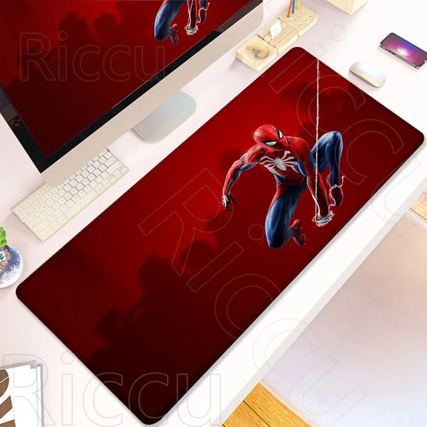 A red Spider-Man anime themed desk mat featuring a character in a dynamic pose, placed on a white surface.
