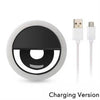 حلقة فوتو ذات إضاءة LED بيضاء بتصميم عين سوداء وكابل شحن USB.