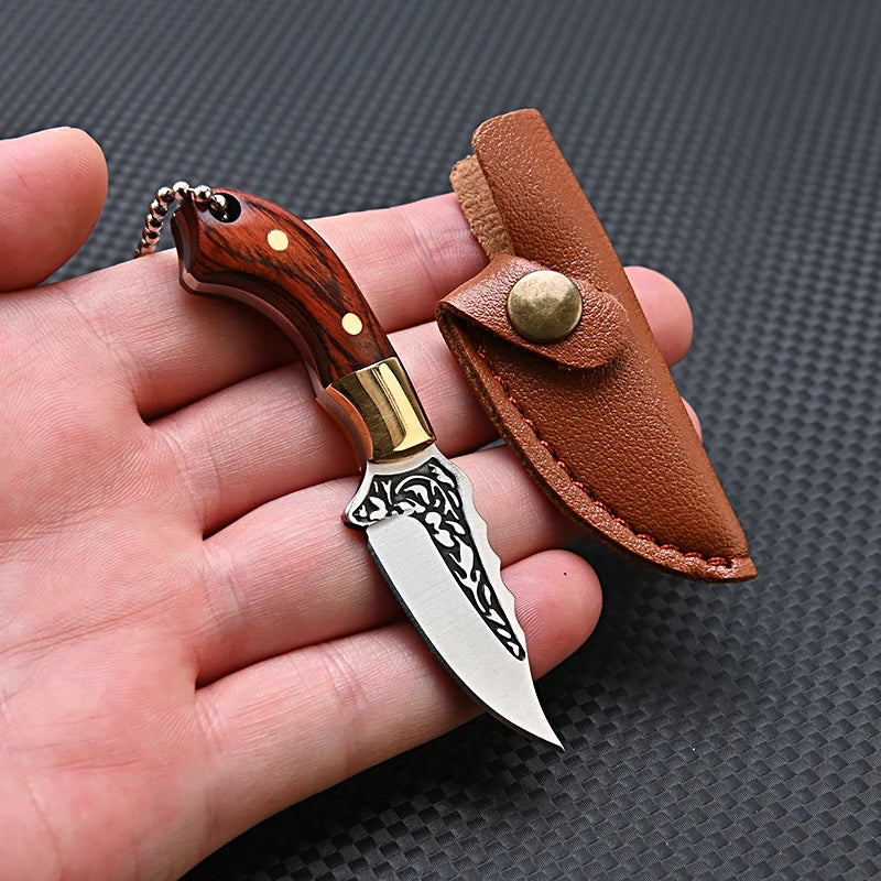 A compact fixed blade knife with a wooden handle and silver blade is shown next to its leather sheath.