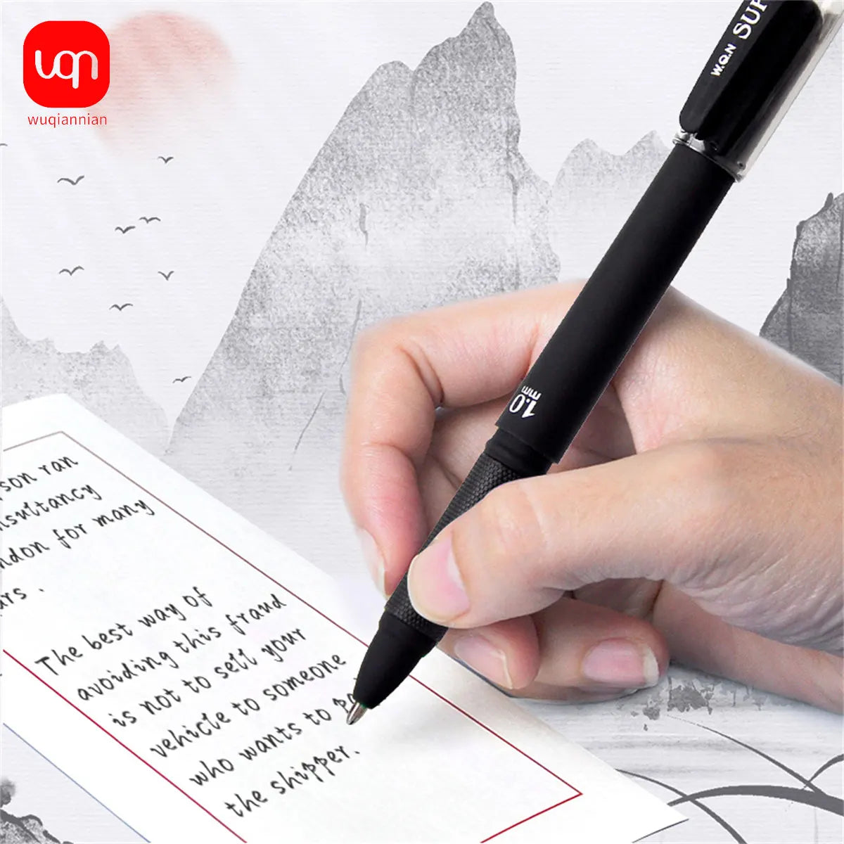 A hand holds a black smooth writing gel pen with a fine 1.0mm tip, writing on a piece of paper.