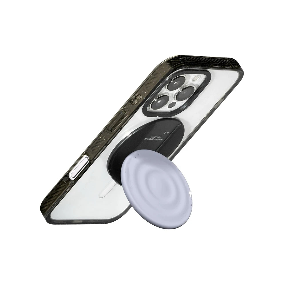 A black and white Ripple Grip magnetic phone stand with a silicone finish.