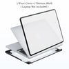 A white laptop is shown with a black face cover and bottom shell, resting on a protective case.