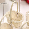 Handwoven rattan basket with a lid showing an oval shape and woven texture.