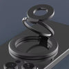 A black MagSafe double-sided phone ring holder stand with a circular base and a coiled ring.