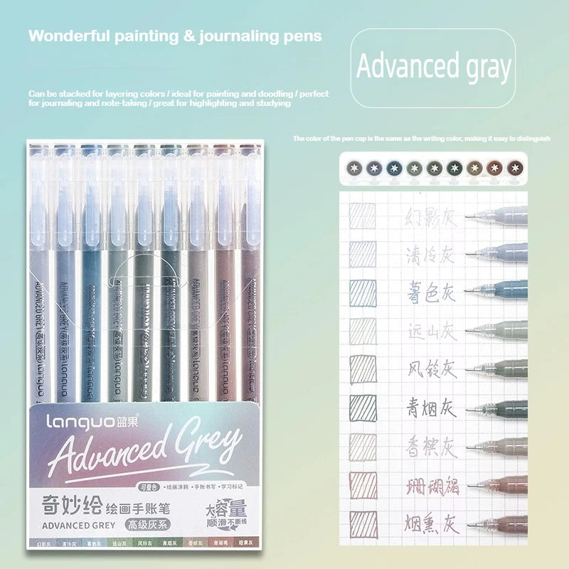 A set of Advanced Grey painting and journaling pens featuring various shades of gray and blue ink.