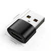 A white USB to USB-C adapter with a black connector shown from above.