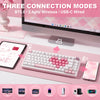 A pink heart-shaped mechanical keyboard is shown next to a laptop and smartphone, demonstrating three connection modes.