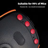 Close-up view of a black PTFE mouse skate with red adhesive dots on the top surface.
