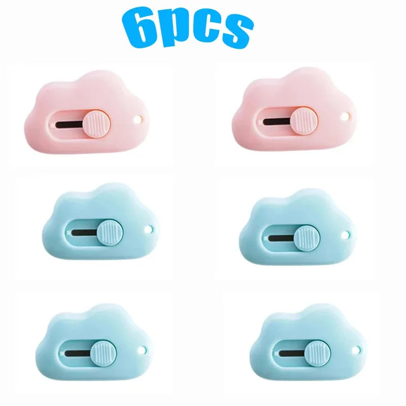 A set of six multi-color rabbit cloud utility knives in pink and light blue.