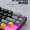 A close-up view of a compact 68-key wired mechanical gaming keyboard with RGB lighting and various angles.