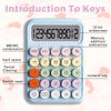 A light blue 12-digit desktop calculator with various function keys and a wide screen display.