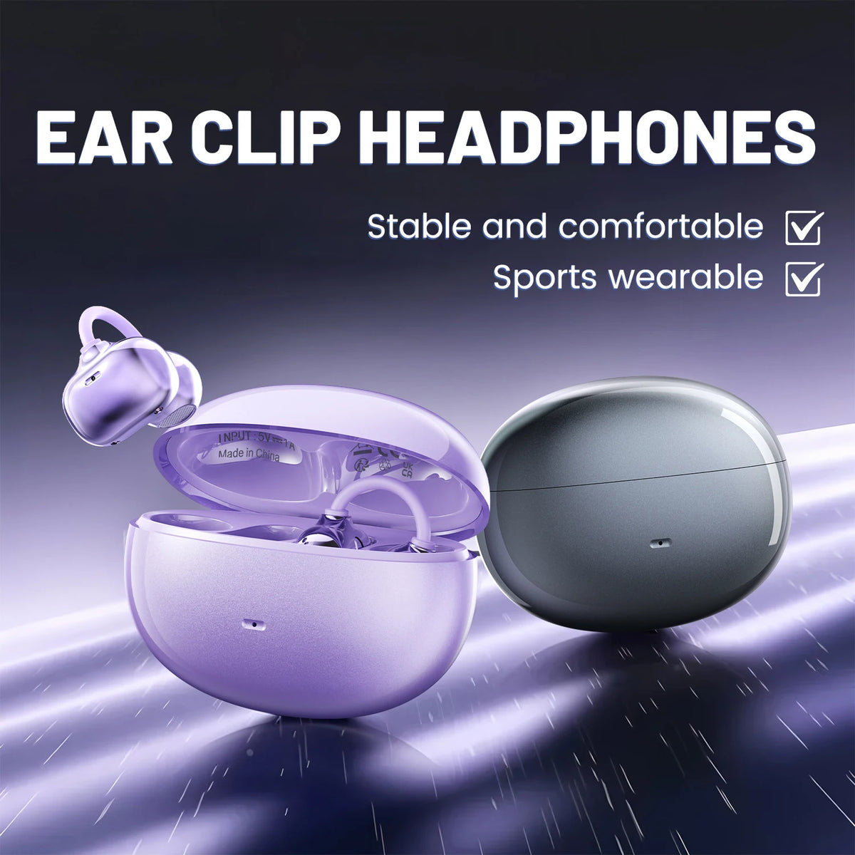 Purple and gray ear clip headphones shown with an open charging case on a reflective surface.