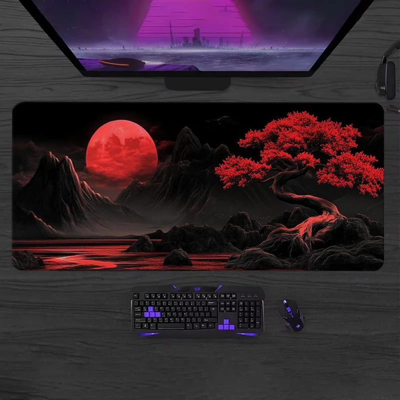 A large silicone gaming mouse pad is displayed on a wooden desk, featuring a dark background and glowing red elements.