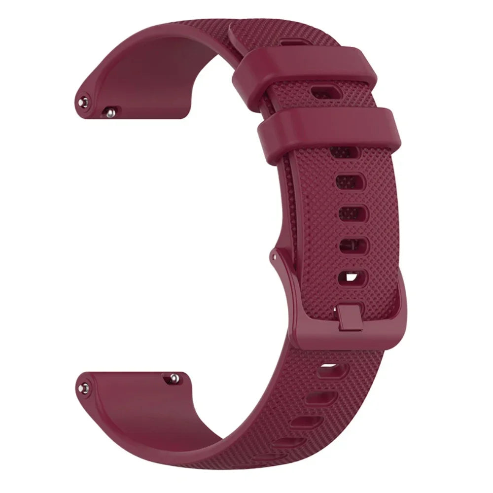 A close-up view of a solid maroon silicone watch band for smartwatches.