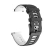 A black silicone watch band with a white display window is shown on a wrist.