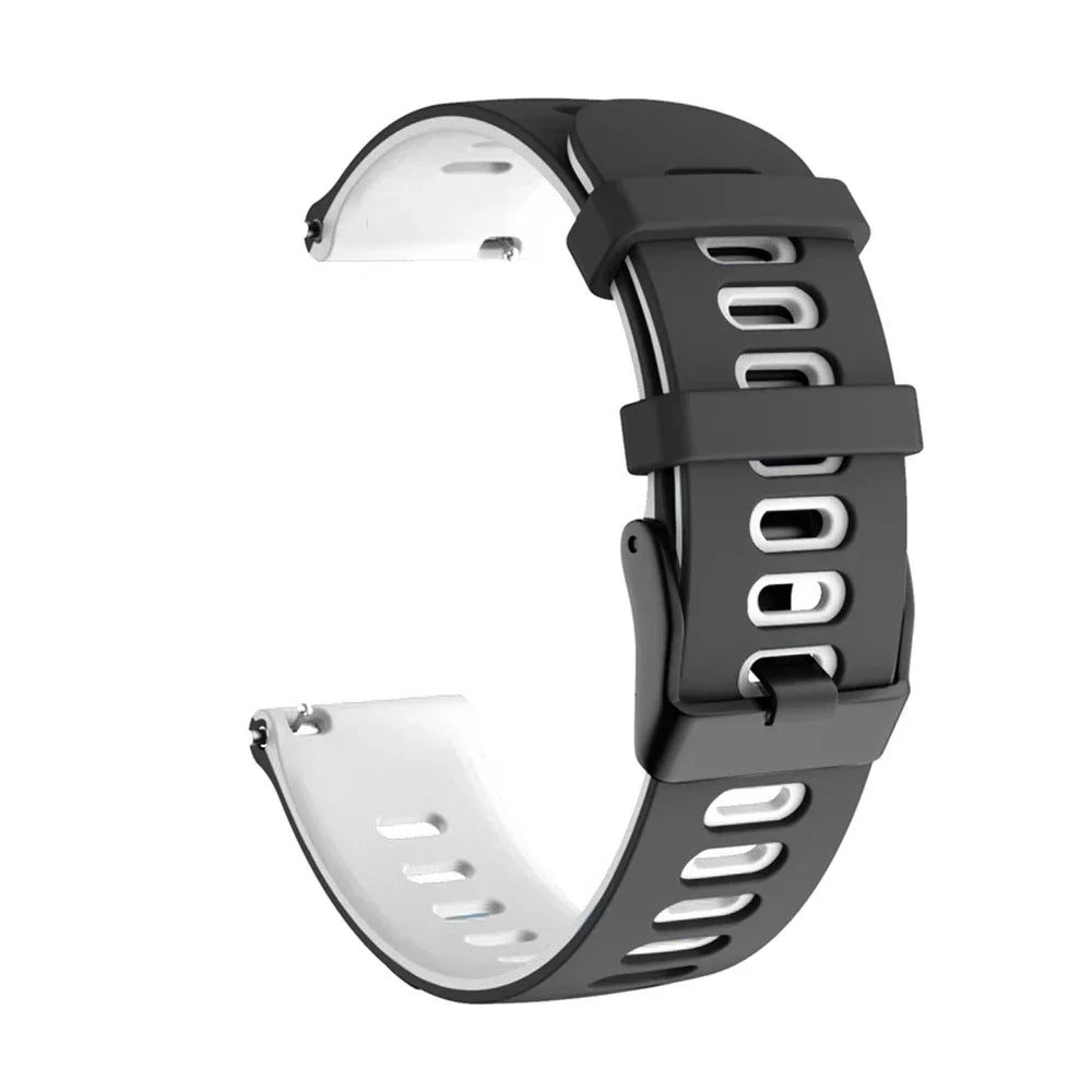 A black silicone watch band with a white display window is shown on a wrist.