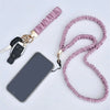 A pink stretchy breakaway lanyard with a retractable reel and an ID badge holder is shown next to a smartphone.
