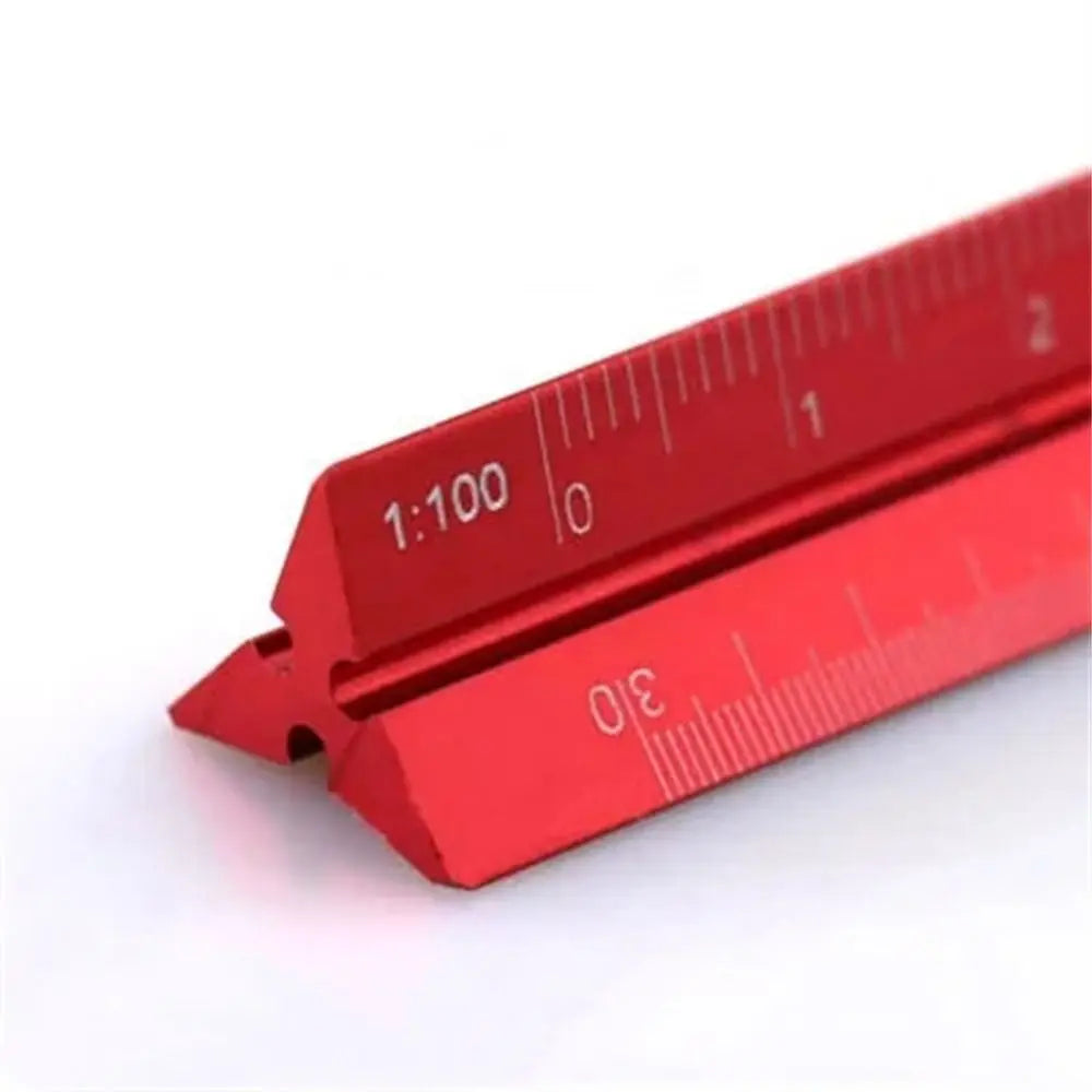 A red aluminum triangular scale ruler showing markings and a 1:100 scale.
