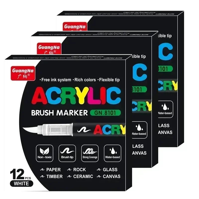 A set of twelve white acrylic brush markers with various tips and colors for DIY art projects.