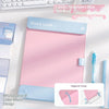 A pink A4 leather clipboard with a blue magnetic closure and contrast stitching, featuring a Good Luck message.