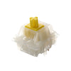 Milky yellow Pro hotswap mechanical keyboard switch with a yellow top cap