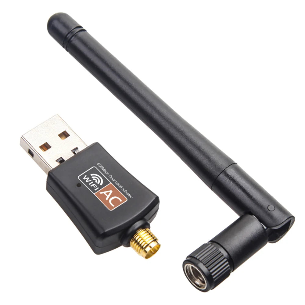 A black dual-band USB Wi-Fi adapter with an AC connector and a detachable antenna.