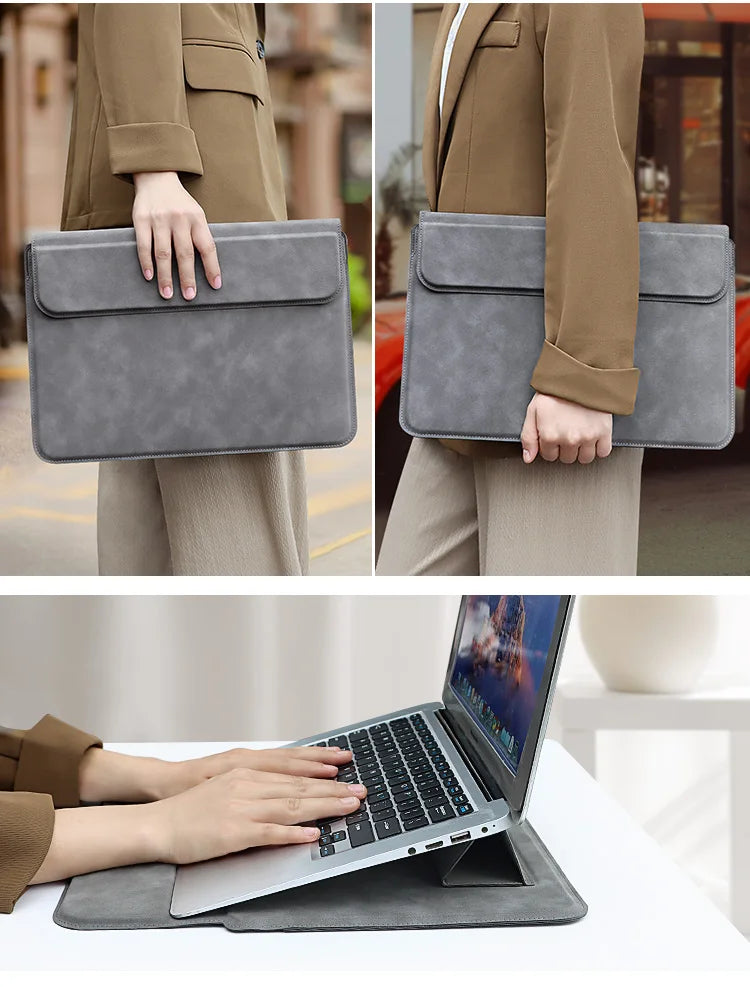 Brauner Blazerärmel zeigt eine graue PU-Leder-Laptop-Hülle, und ein Laptop liegt auf demselben Material.