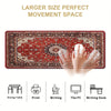 A close-up view of a red vintage Persian rug gaming mouse pad with a non-slip rubber base and a hand demonstrating its large 
