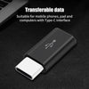 A black USB Type-C to Micro USB adapter converter is shown on a dark surface.