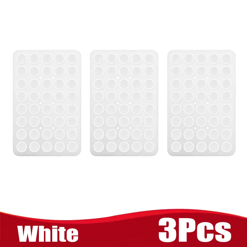 Three white silicone suction cup phone holders for mounting devices