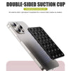A silver smartphone is shown with a black double-sided suction cup mount attached to the back.