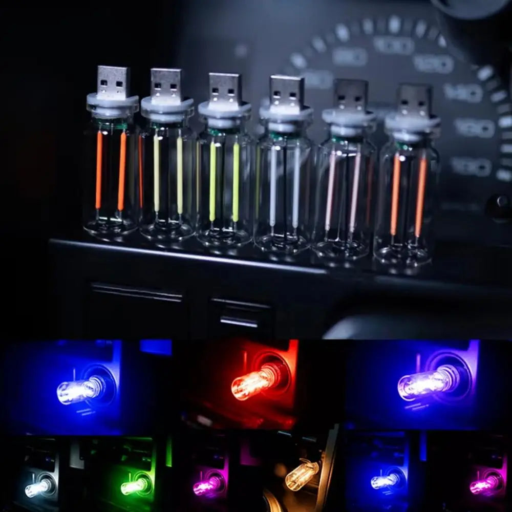 A set of two retro Edison USB LED bulbs with touch dimming displayed in a dark setting.