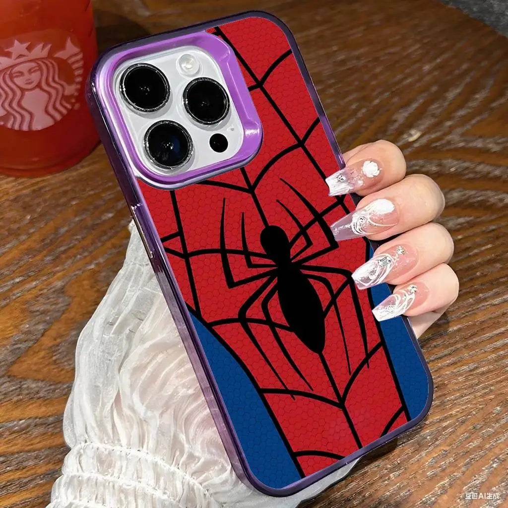 A hand holds a phone case featuring a red spiderweb design on a dark background.