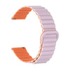 A close-up view of a light purple adjustable magnetic loop watch band with an orange buckle.