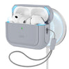 A gray charging case for AirPods Pro is shown with the lid open, connected to a white cord.