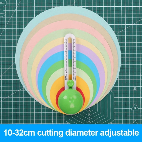 A green precision circular crafting knife set with an adjustable 10-32cm diameter and a clear measuring scale.