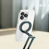 A white smartphone is held in place by a black magnetic phone holder stand made of CNC aluminum alloy.
