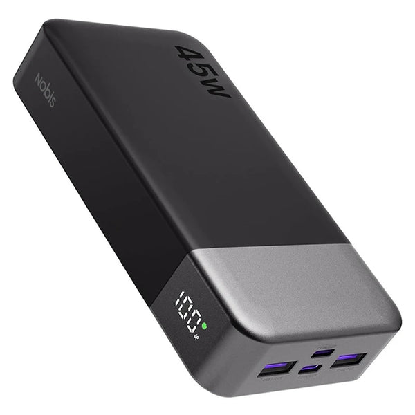 A black portable power bank with a silver base showing a 100% charge indicator.