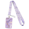 A purple marbled lanyard with a gold-colored clip and strap for ID badges and accessories.